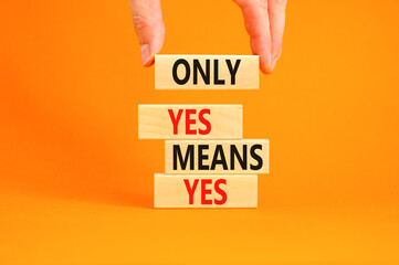 Wall Mural - Only yes means yes symbol. Concept words Only yes means yes on wooden blocks on a beautiful orange table orange background. Businessman hand. Business, psychological only yes means yes concept.