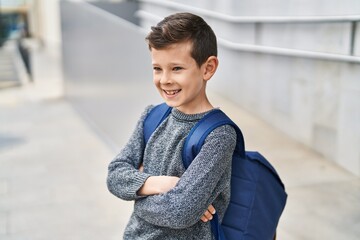 Poster - Blond child student smiling confident standing with arms crossed gesture at school