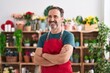 © Krakenimages.com - Middle age man florist smiling confident standing with arms crossed gesture at florist
