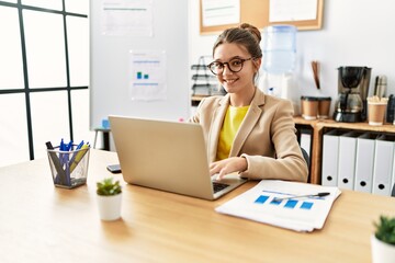 Sticker - Adorable girl business worker using laptop working at office