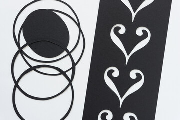 Canvas Print - paper rings and oval with stencil and ornamental shapes on blank paper