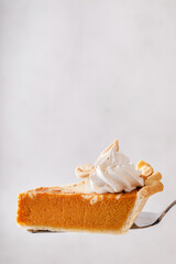 Wall Mural - Pumpkin cheesecake swirl pie topped with whipped cream