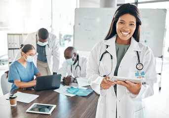 Poster - Portrait of happy doctor with digital tablet in a planning meeting with healthcare workers in an office. Medical expert research on laptop during teamwork, collaboration and support strategy online