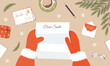 © KeronnArt - Santa claus hands holding childish letter. Receiving Christmas postcard with congratulations and wish list. Top view. Vector illustration in flat cartoon style. Winter holidays.