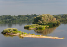 Summer. Morning Light. A Bend In A Large River, An Island, A Sandbank. Forest And Bush