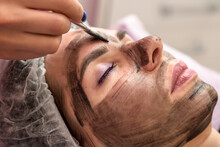 Portrait Of A Woman In A Beauty Salon Carbon Peeling Procedure, Close-up.