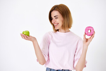 Poster - woman choosing between donut and green apple