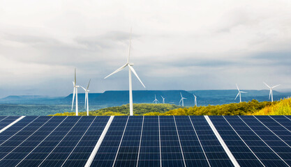 Wall Mural - solar panel and wind turbine blue sky with sun background. concept clean power