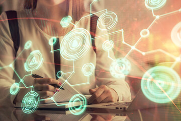 Aufkleber - Double exposure of woman hands typing on computer and social network theme hologram drawing. People media concept.