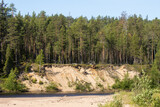 Fototapeta Łazienka - A steep sandy river bank on a sunny summer day in Oulanka National Park, Northern Finland
