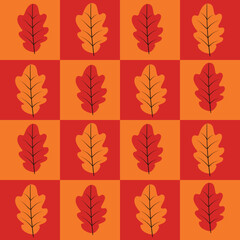 Wall Mural - Beautiful autumn leaves on orange and red checkerboards seamless pattern. For autumn backgrounds, fabric, textile and home décor 