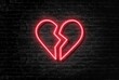 Creative concept illustration broken heart neon sign signboard on the brick wall.