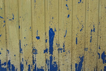 Poster - blue yellow texture from an old shabby metal wall with pieces of paint