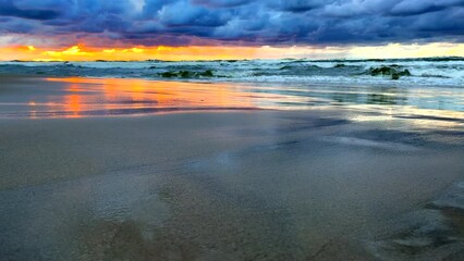 Wall Mural - Colorful sunset on Baltic Sea beach. 