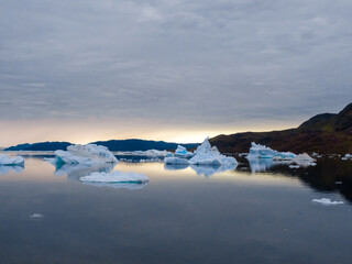 Poster - The iceberg filled waters of the Tunulliarfik and Sermilik Fjords on the shores of the port settlement of Narsaq, Southern Greenland