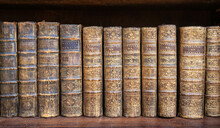 Close Up Of  Old Books  On A Bookshelf At An French  Antique Shop