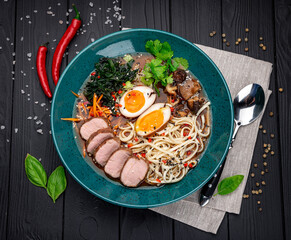 Wall Mural - Asian ramen soup with meat, homemade noodles, mushrooms and pickled egg