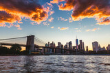 Fototapeta  - New York City Skyline during the Sunset on Manhattan bridge. 
