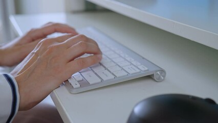 Aufkleber - close up female hands typing on white keyboard working at work place