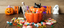 Happy Halloween Day With Ghost Candies, Candle, Pumpkin, Jack O Lantern And Decorative (selective Focus). Trick Or Threat, Hello October, Fall Autumn, Festive, Party And Holiday Concept