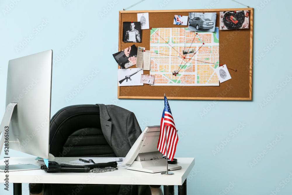 Modern workplace of FBI agent in office