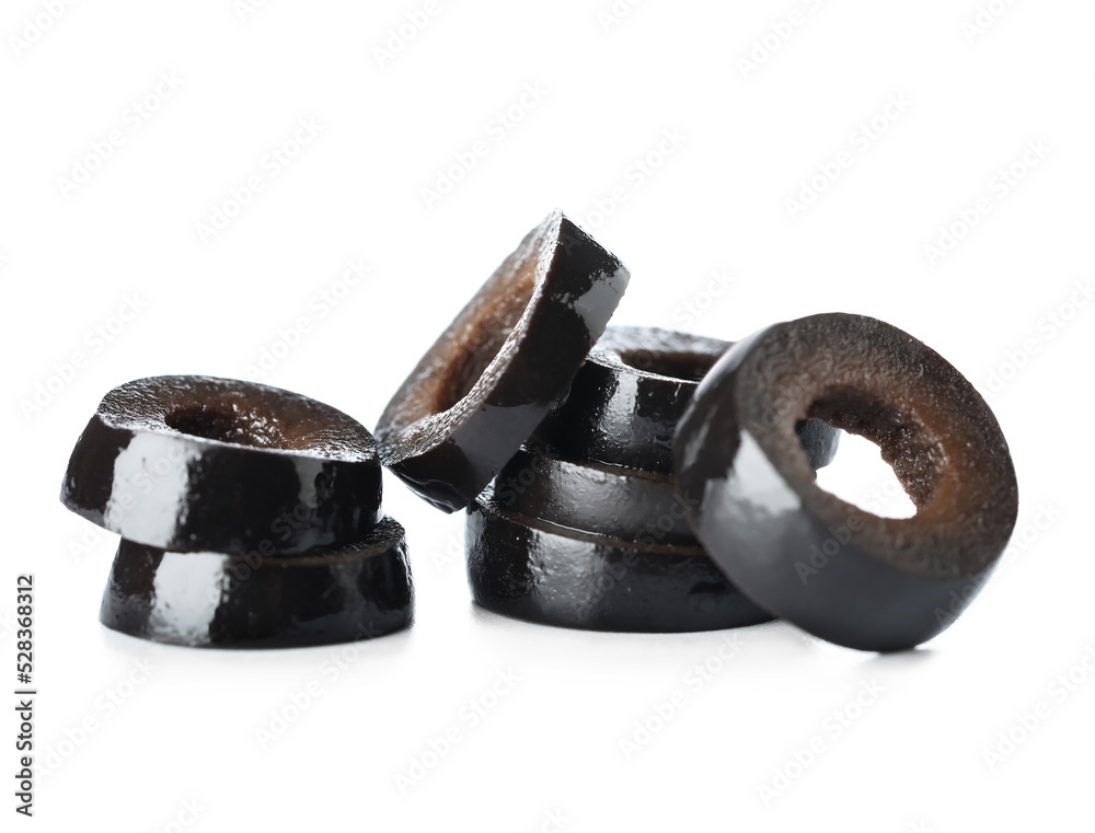Heap of black olives slices on white background