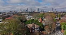 Atlanta Aerial V778 Low Level Flyover Train Tracks Across Inman Park Residential Neighborhood Along Beltline Trail With Downtown Cityscape In The Background - Shot With Mavic 3 Cine - December 2021