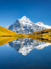 Wall Mural - high mountains and reflection on the surface of the lake. mountain valley with lake. landscape in th