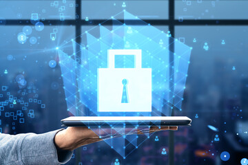 Poster - Close up of hand holding tablet with creative glowing blue padlock grid hologram on blurry bokeh background with window frame and city view. Secure, safety and web protection concept.