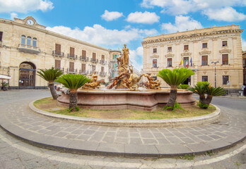 Wall Mural - Ortigia island of Siracusa (Sicilia, Italy) - A historical center view of the touristic baroque island in the municipal of Siracusa, Sicily, during the summer; UNESCO site, with castle and old church