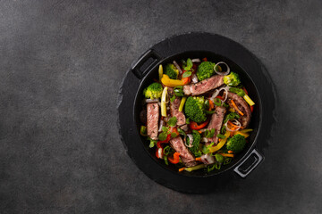 Wall Mural - Beef with vegetables. Prepared in a wok.