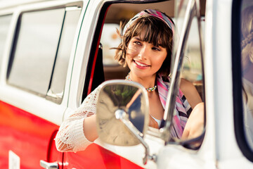 Sticker - Photo of charming attractive dreamy young lady driving retro bus smiling outdoors countryside road