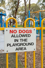 No Dogs Allowed In The Playground Area Sign In The Park