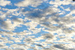 blue sky with altocumulus clouds