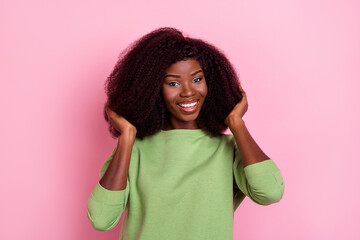 Sticker - Photo of beauty wavy hairdo brunette lady touch chevelure wear green sweatshirt isolated on pink color background