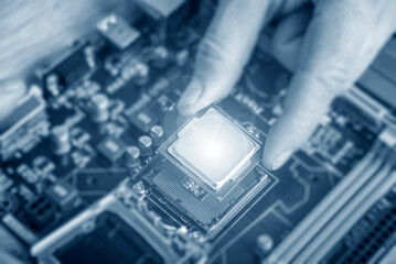 Poster - Installing central processor unit into computer motherboard.