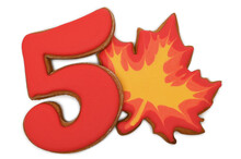 Gingerbread Cookie In The Form Of A Number 5 And Maple Leaf On White Background. Knowledge Day On September 1