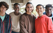 Group of happy multiethnic boys smiling on camera at school outdoor