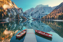 Boats On The Braies Lake ( Pragser Wildsee ) In Dolomites Mountains, Sudtirol, Italy. Alps Nature Landscape.