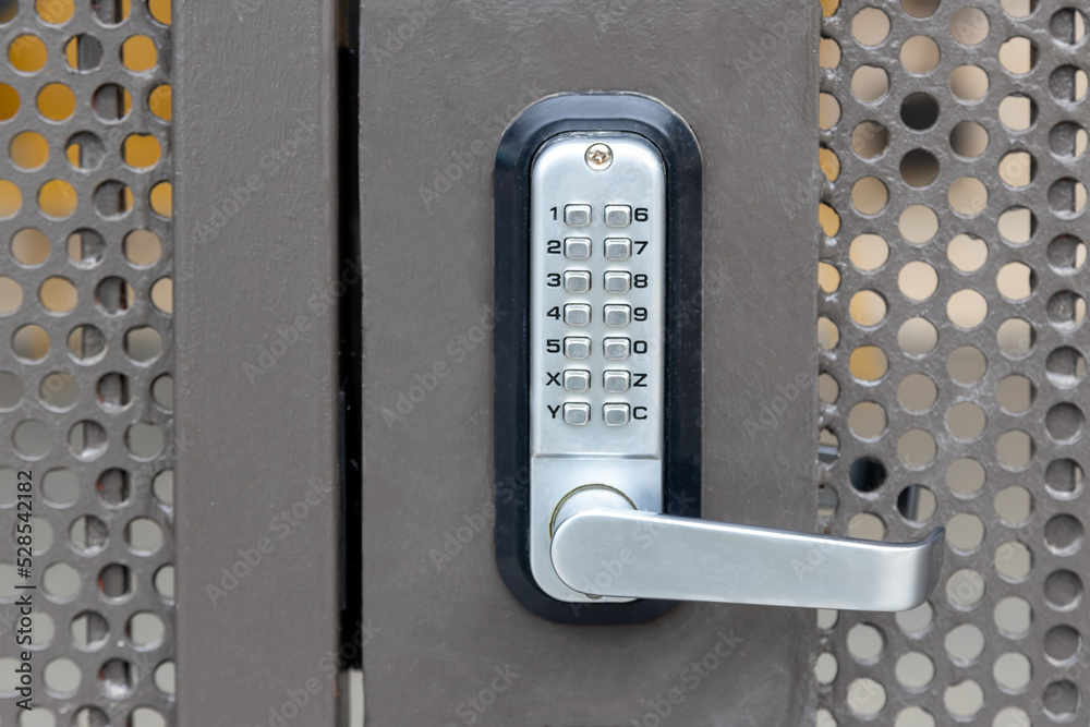 Locked private metal security gate door with push button combination ...