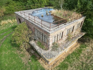 Wall Mural - 
Aerial view of World war two military airfield control tower at Forma RAF Woolfox Lodge Aerodrome. Rutland, England. Royal Air Force Woolfox Lodge or more simply RAF Woolfox Lodge 