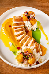 Wall Mural - chicken breast with rice and sauce