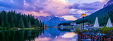 Fototapeta  - Amazing nature view of Misurina Lake and mountain range during a beautiful sunset. Location: Lake Misurina, Dolomites Alps, South Tyrol, Italy, Europe. Artistic picture. Beauty world. 