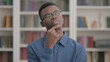 © stockbakers - Pensive Young African Man Thinking New Idea