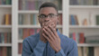 © stockbakers - Disappointed Young African Man Reacting to Loss