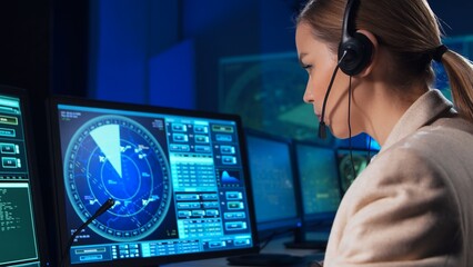 Wall Mural - Workplace of the air traffic controllers in the control tower. Team of professional aircraft control officers works using radar, computer navigation and digital maps. Aviation concept.