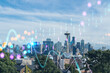 Seattle skyline panorama from Kerry Park. Skyscrapers of financial downtown at day time, Washington, USA. Forex candlestick graph hologram. The concept of internet trading, brokerage, analysis