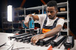 © sata_production - Male factory worker using electric screwdriver