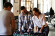 © JustLife - Colleagues having fun at work. Businessman and businesswoman playing table soccer.