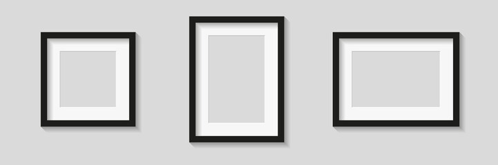 Black empty photo or picture frames with mats and shades isolated on gray background. Vector illustration. Wall decor. Rectangle and square vertical and horizontal photo frame